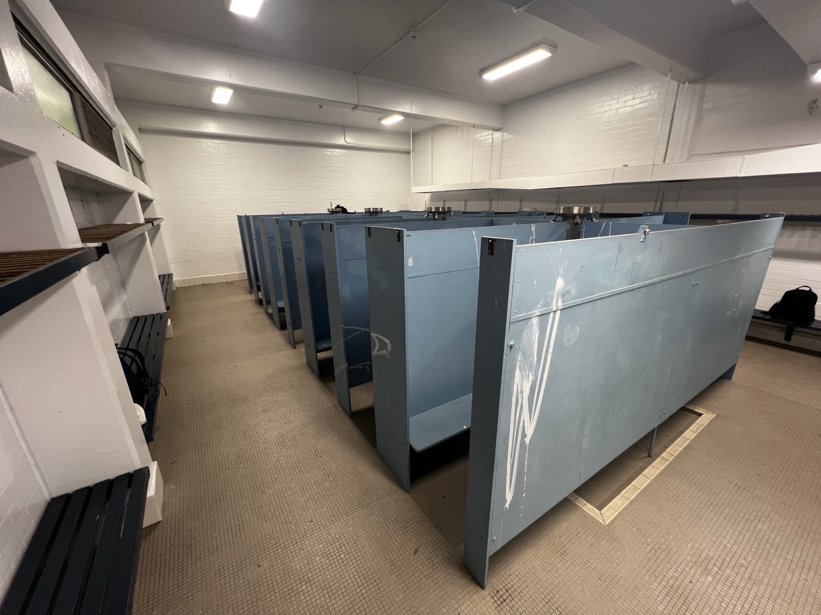 Amenities partitions before strip-out, Sydney Secondary College
