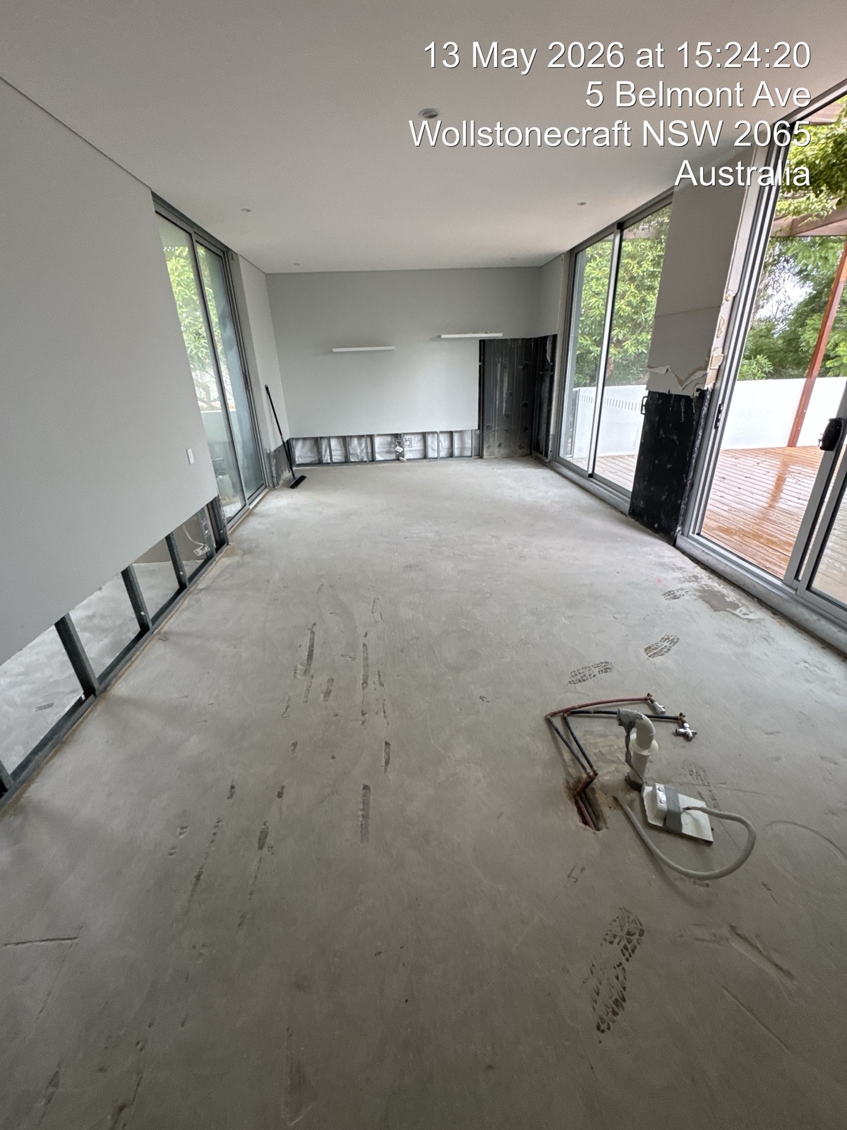 Interior stripped to slab after asbestos flooring removal, Wollstonecraft