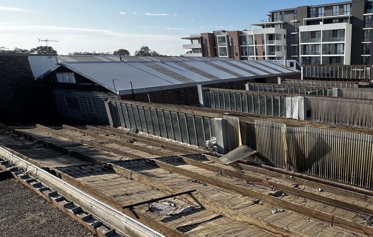 Commercial roof at the start of asbestos removal works, Rockdale